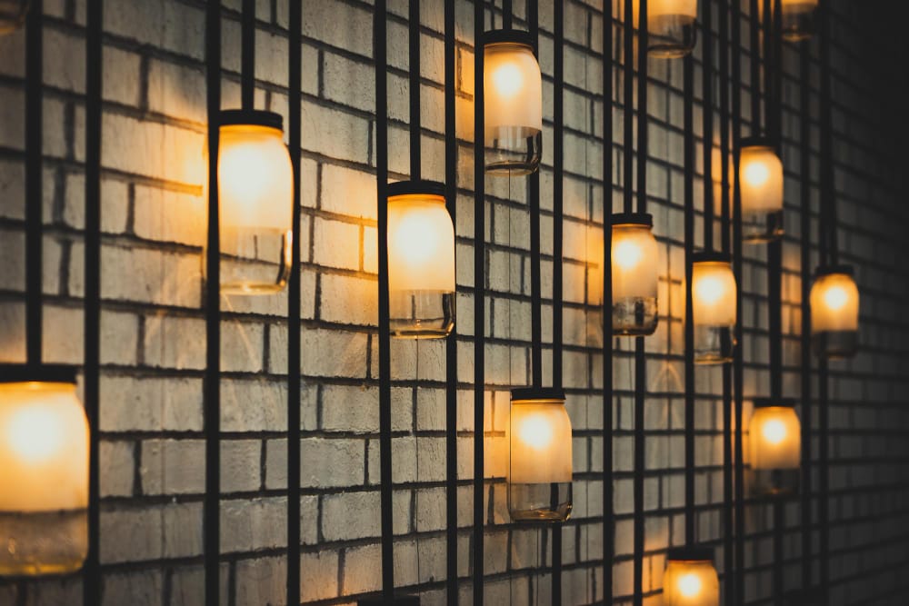 lights on a exposed brick wall